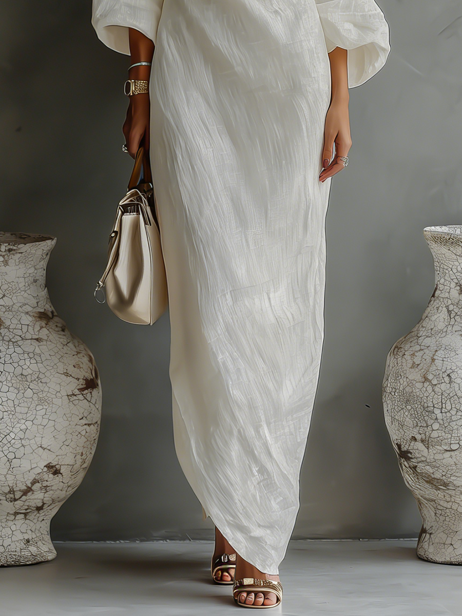 Abito elegante in cotone-lino bianco avorio con spalle scoperte e design fluttuante