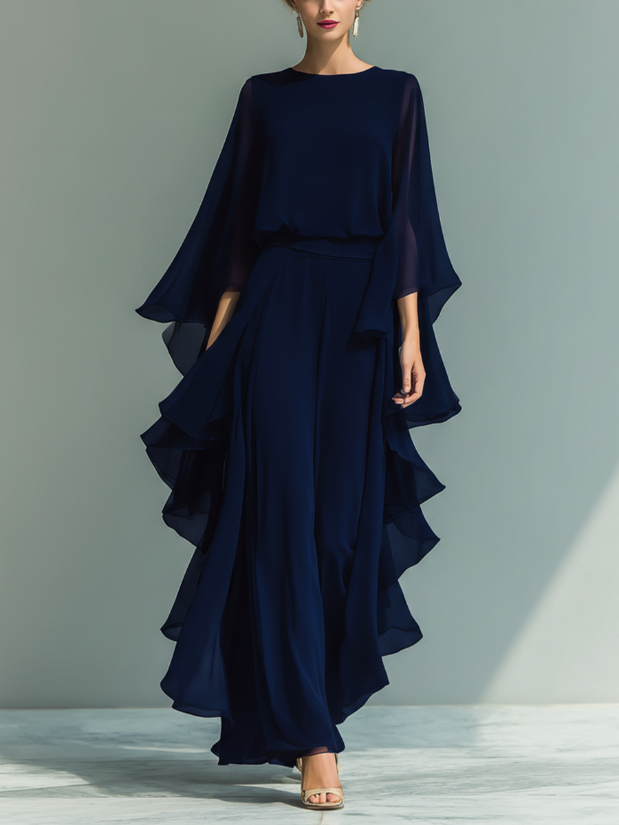 Completo da donna top in chiffon blu scuro con maniche a campana e pantaloni dritti con dettagli a balze