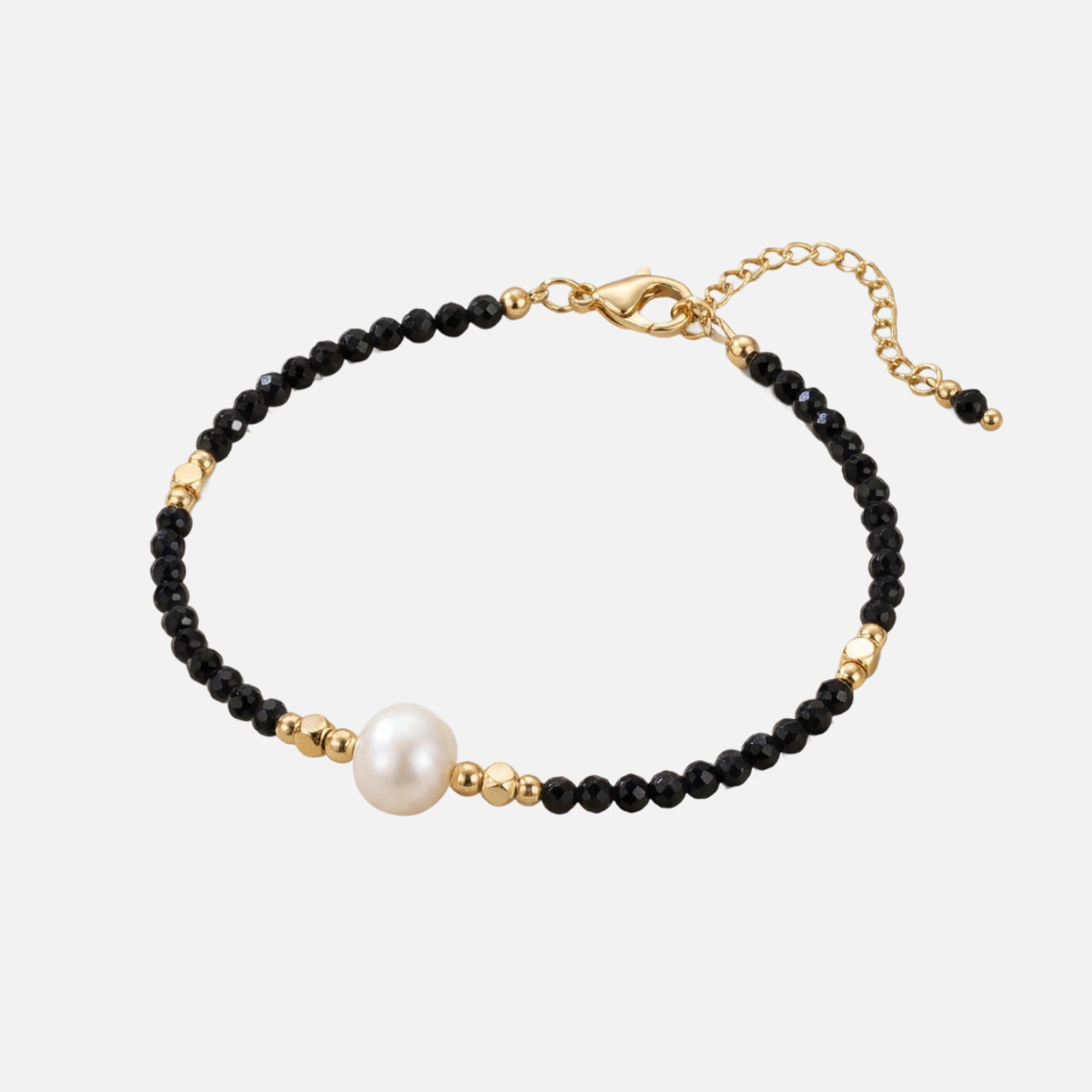 BRACCIALE IN PERIDOTO E PERLE
