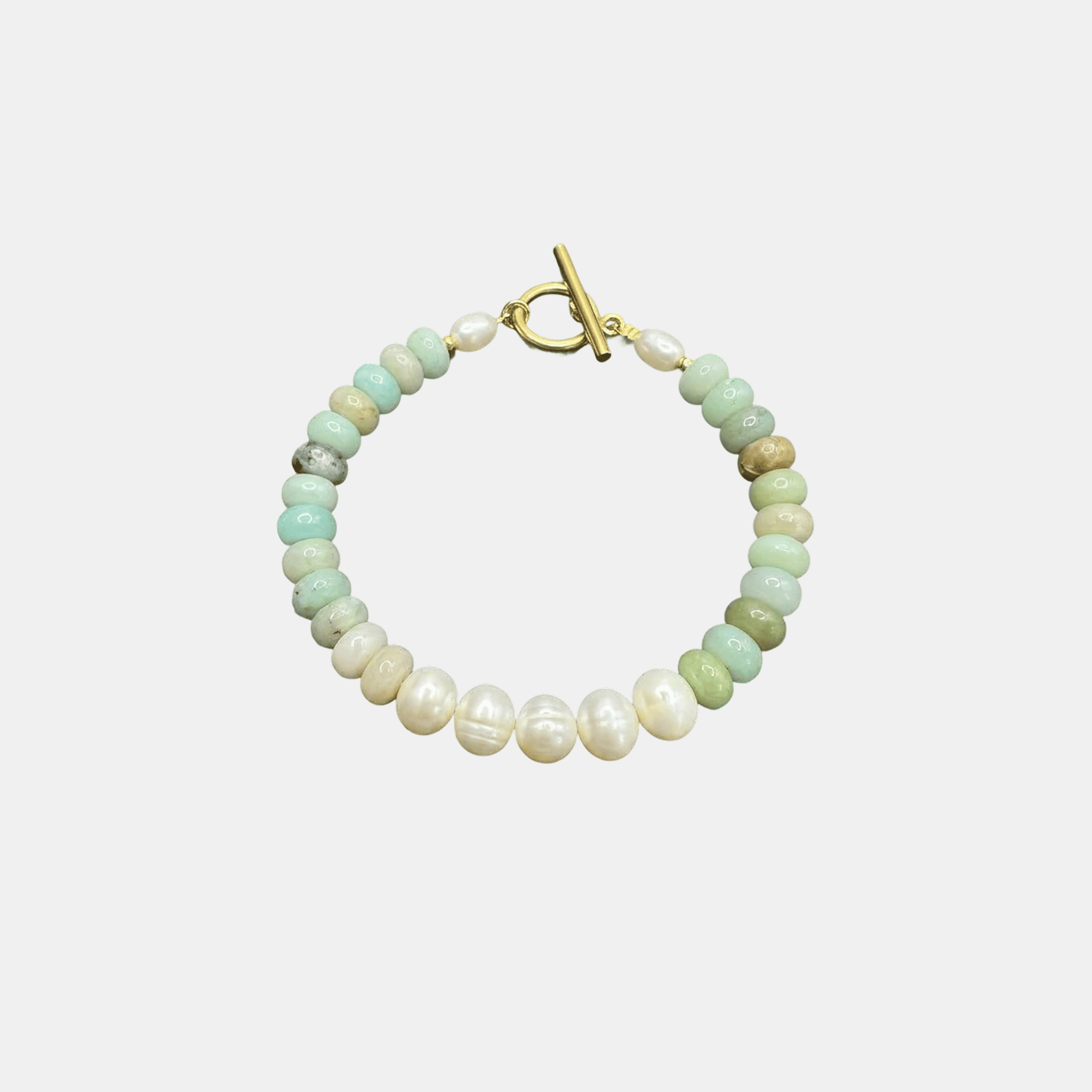 BRACCIALE TURCHESE CON PERLA AL CENTRO