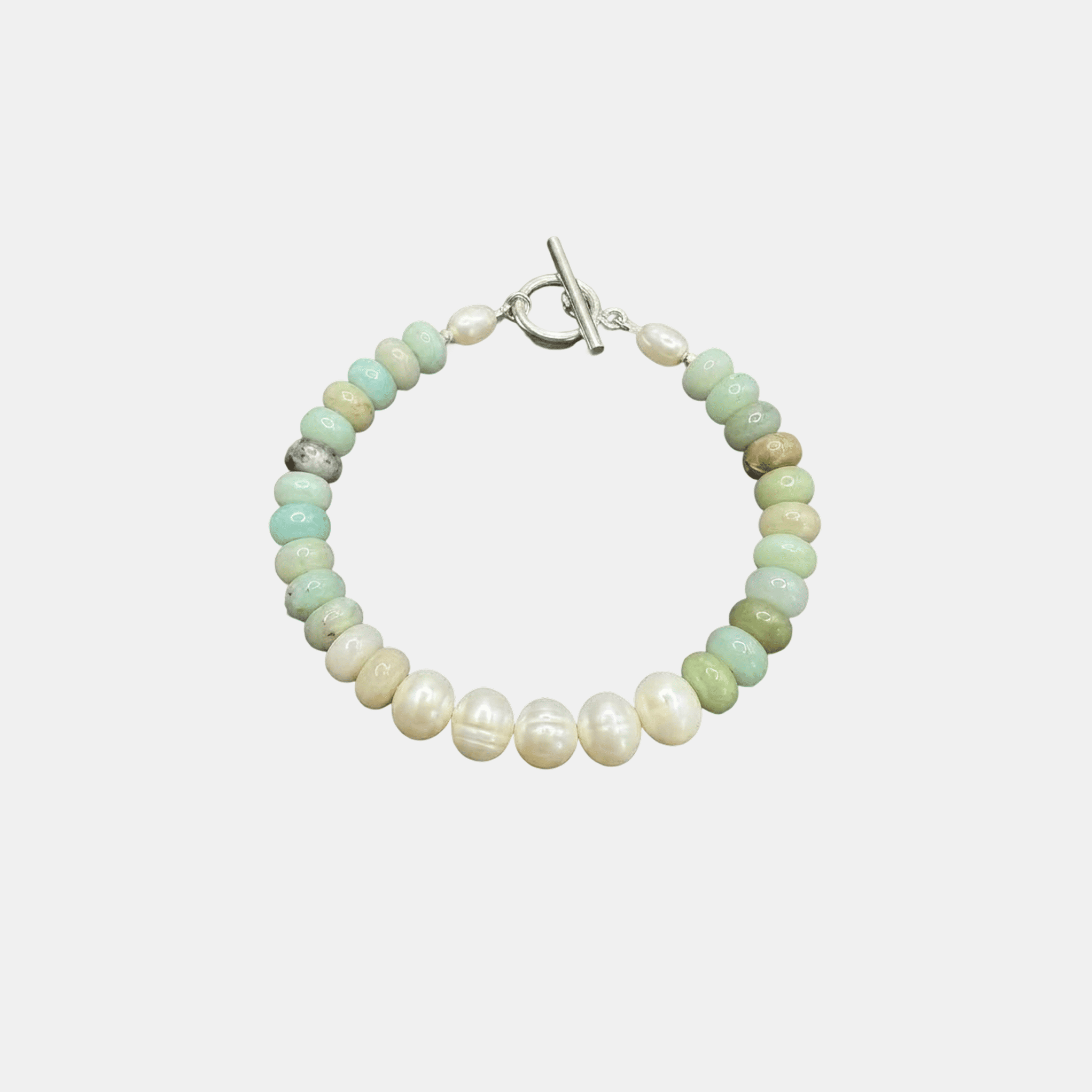 BRACCIALE TURCHESE CON PERLA AL CENTRO