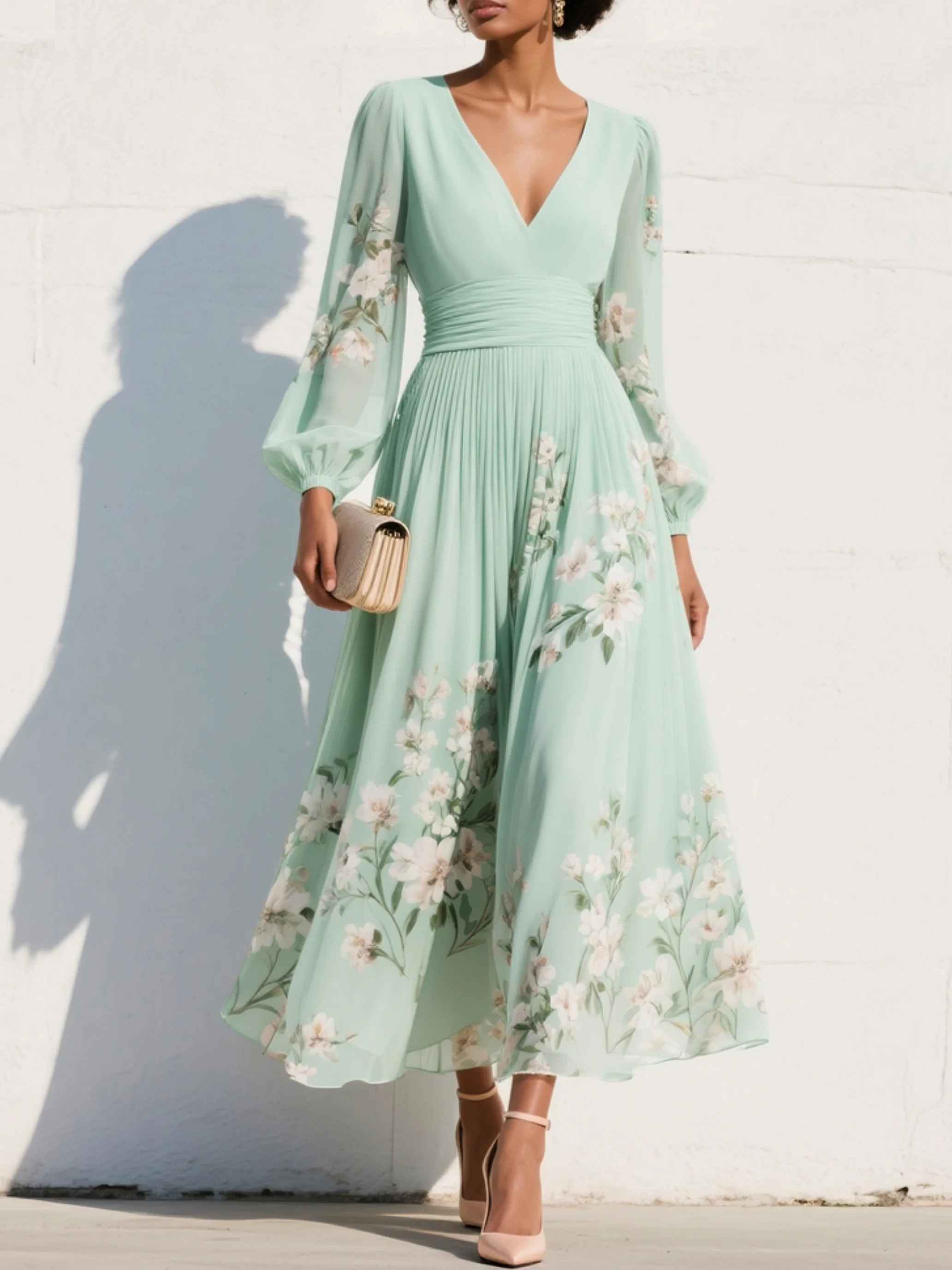 Abito lungo plissettato in chiffon verde menta con stampa floreale da donna