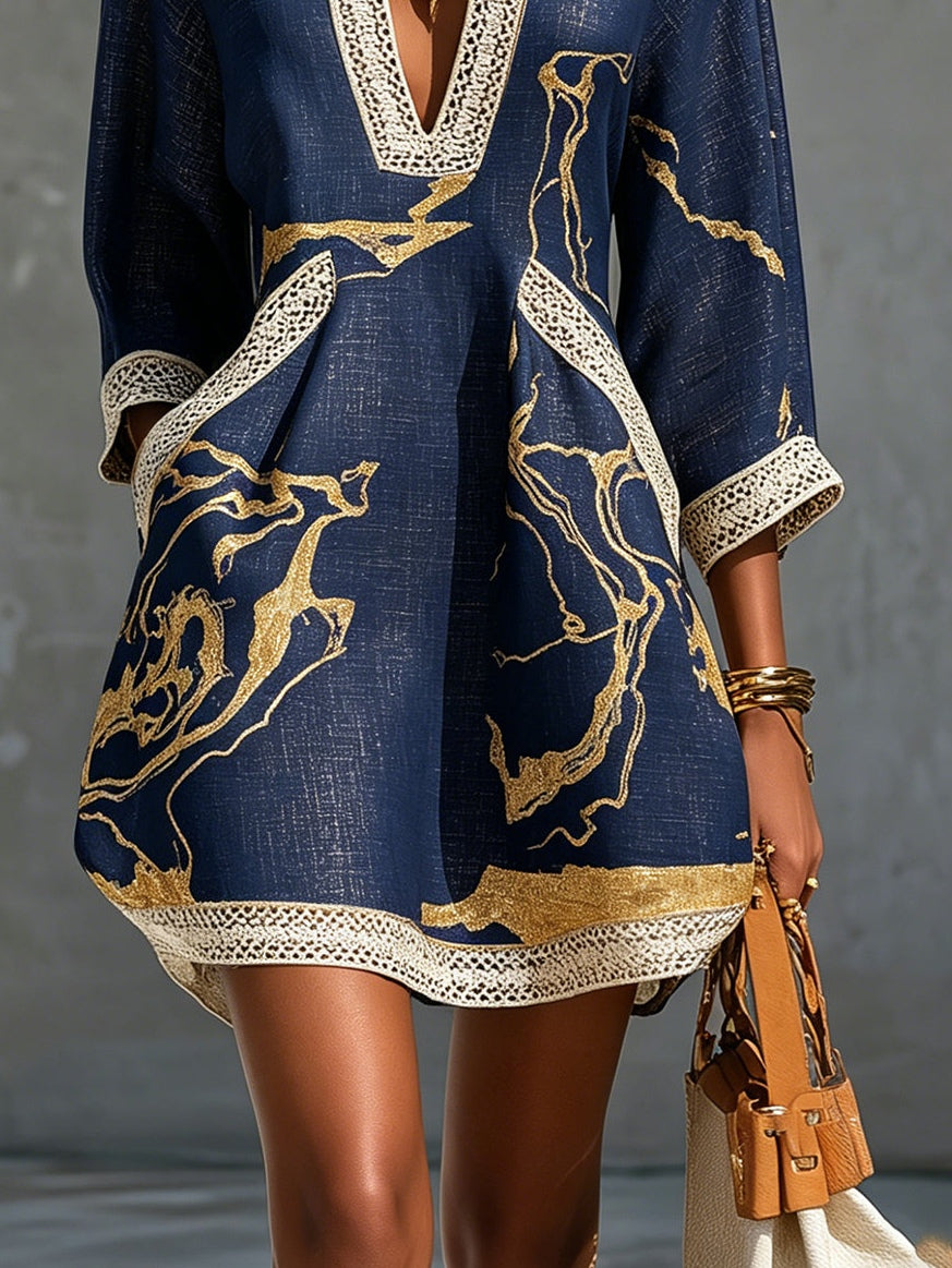 ASTRÉE | MINI ABITO CON SCOLLO A V, STAMPA DORATA BLU NAVY