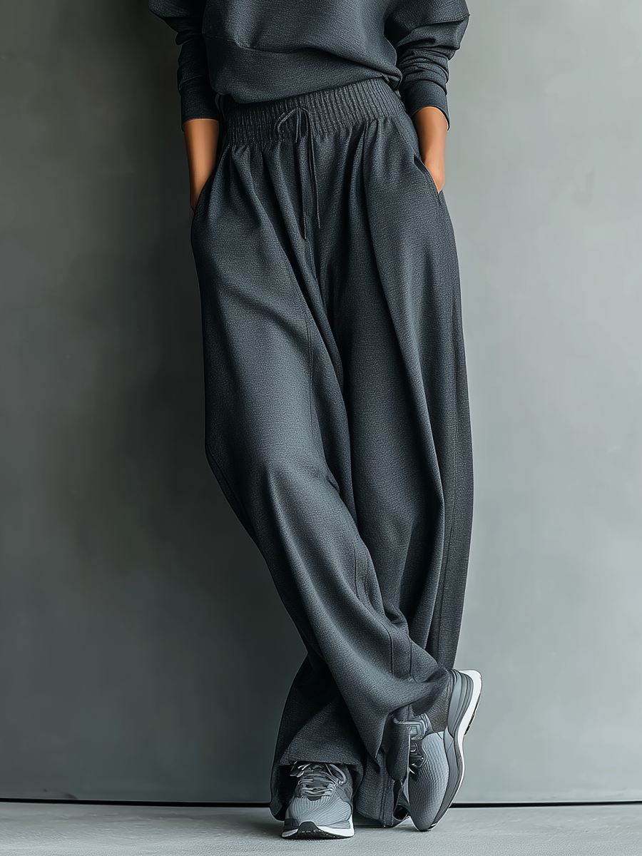 COMPLETO DONNA IN MAGLIA ANTRACITE CON COLLO ALTO E PANTALONI A GAMBA LARGA