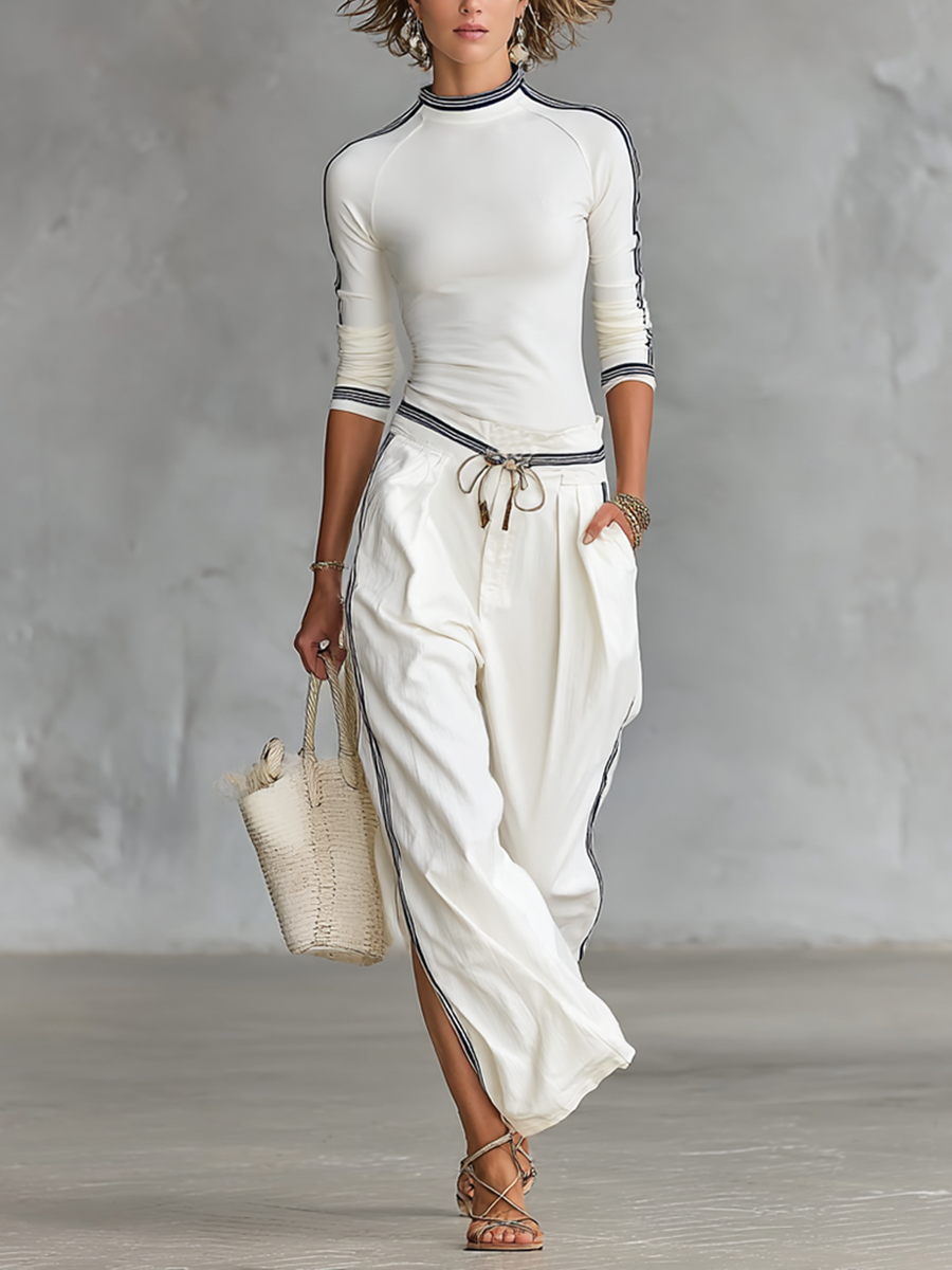 SET DUE PEZZI DA DONNA: T-SHIRT SPORTIVA A MANICHE LUNGHE CON COLLO A MEZZO ALTO E PANTALONI LARGHI CON COULISSE